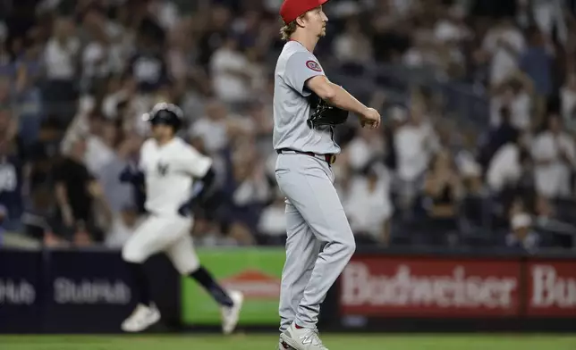 St. Louis Cardinals starting pitcher Erick Fedde reacts after giving up a two-run home run to New York Yankees Austin Wells during the third inning of a baseball game, Friday, Aug. 30, 2024, in New York. (AP Photo/Adam Hunger)