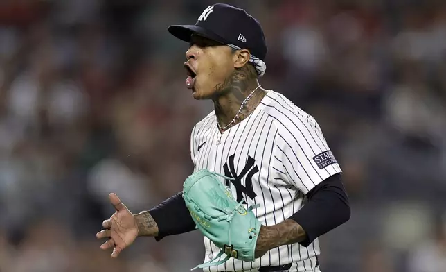 New York Yankees starting pitcher Marcus Stroman reacts after the final out during the sixth inning of a baseball game against the St. Louis Cardinals, Friday, Aug. 30, 2024, in New York. (AP Photo/Adam Hunger)