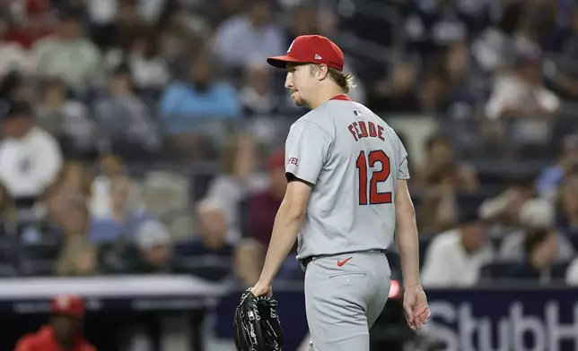 St. Louis Cardinals starting pitcher Erick Fedde reacts walking to the dugout after being taken out of the game during the sixth inning of a baseball game against the New York Yankees, Friday, Aug. 30, 2024, in New York. (AP Photo/Adam Hunger)