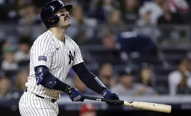 New York Yankees' Austin Wells hits a two-run home run during the eighth inning of a baseball game against the St. Louis Cardinals, Friday, Aug. 30, 2024, in New York. The Yankees won 6-3. (AP Photo/Adam Hunger)