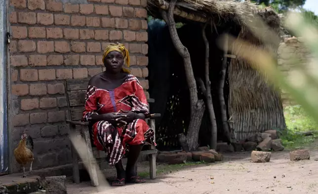 The village chief Marie Djetoyom sits in a chair in the village of Binmar, Chad, Friday, July 19, 2024. (AP Photo/Robert Bociaga)