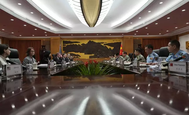 Zhang Youxia, Vice Chairman of the CPC Central Military Commission, fourth from right holds a meeting with White House national security adviser Jake Sullivan, fourth from left. at the Bayi building in Beijing, Thursday, Aug. 29, 2024. (AP Photo/Ng Han Guan, Pool)