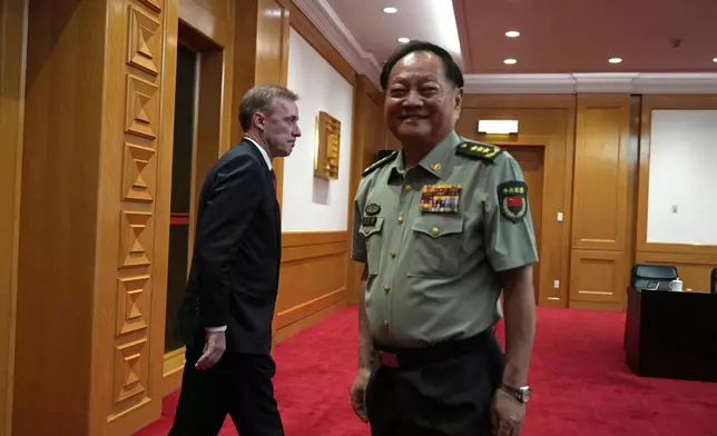 White House national security adviser Jake Sullivan, left walks past Zhang Youxia, Vice Chairman of the CPC Central Military Commission at right before a meeting at the Bayi building in Beijing, Thursday, Aug. 29, 2024. (AP Photo/Ng Han Guan, Pool)