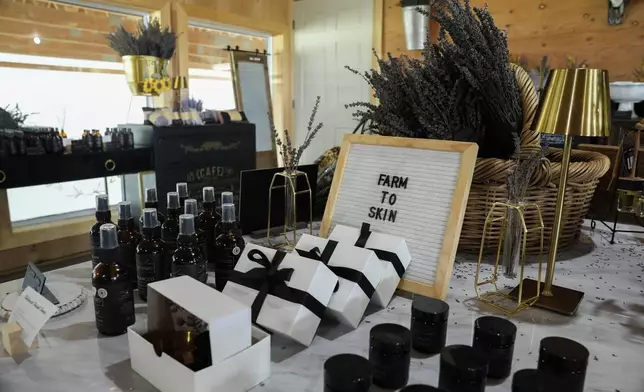 Lavender-infused beauty products sit out for sale, Wednesday, Aug. 21, 2024, at Hereward Farms in East Garafraxa, Ontario. (AP Photo/Joshua A. Bickel)