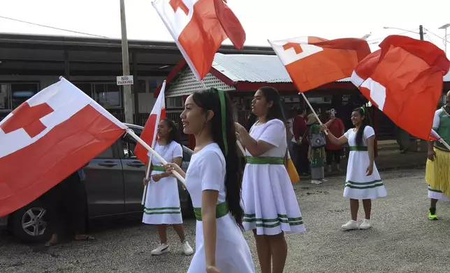 High school students march for climate justice as Pacific leaders meet in Nuku'alofa, Tonga, Tuesday, Aug. 27, 2024. (AP Photo/Charlotte Graham-McLay)