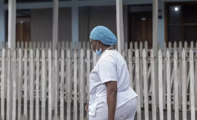 Doctor Rachel Maguru does rounds at the general hospital in Goma, Democratic Republic of Congo, Wednesday, Aug. 14, 2024 after the World Health Organization declared the mpox outbreaks in Congo and elsewhere in Africa a global emergency. (AP Photo/Moses Sawasawa)