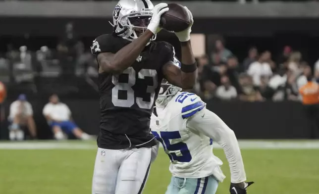 Las Vegas Raiders wide receiver Kristian Wilkerson (83) makes a catch against the Dallas Cowboys during the first half of an NFL preseason football game, Saturday, Aug. 17, 2024, in Las Vegas. (AP Photo/Rick Scuteri)