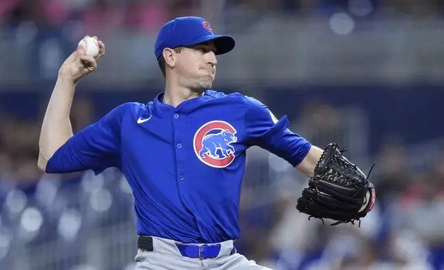 Chicago Cubs' Kyle Hendricks delivers a pitch during the first inning of a baseball game against the Miami Marlins, Friday, Aug. 23, 2024, in Miami. (AP Photo/Wilfredo Lee)