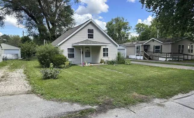 FILE - Sonya Massey's home, the scene of her fatal shooting, stands Thursday, July 18, 2024, in Springfield, Ill. Prosecutors have charged a sheriff's deputy with Massey's murder. Sean Grayson is accused of shooting the Black woman in the face on July 6, 2024, while responding to her report of an intruder at her home. (AP Photo/John O'Connor, File)