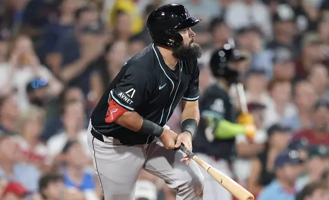 Arizona Diamondbacks' Luis Guillorme watches his RBI double during the sixth inning of a baseball game against the Boston Red Sox, Friday, Aug. 23, 2024, in Boston. (AP Photo/Michael Dwyer)