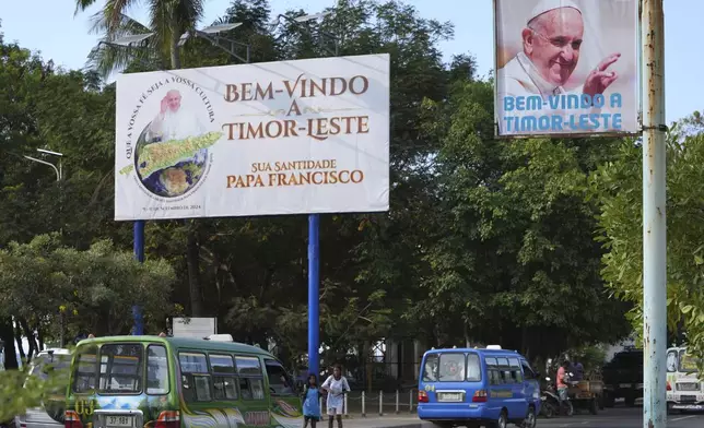 Billboards welcoming Pope Francis are seen in Dili, East Timor, Tuesday, Aug. 13, 2024. (AP Photo/Achmad Ibrahim)