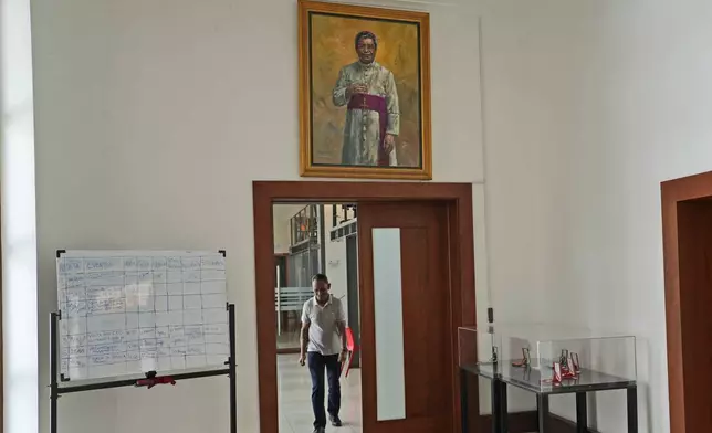 The painting of Nobel Peace Prize winner Bishop Carlos Ximenes Belo is displayed at the Timorese Resistance Museum in Dili, East Timor, Tuesday, Aug. 13, 2024. (AP Photo/Achmad Ibrahim)