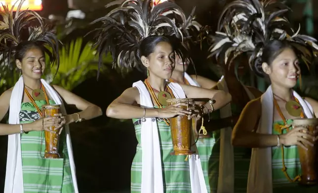 East Timorese dancers perform during the commemoration of the 25th year anniversary of the referendum that led to the country's independence from Indonesia, in Dili, East Timor, Friday, Aug. 30, 2024. (AP Photo/Carlos Caro Junior)