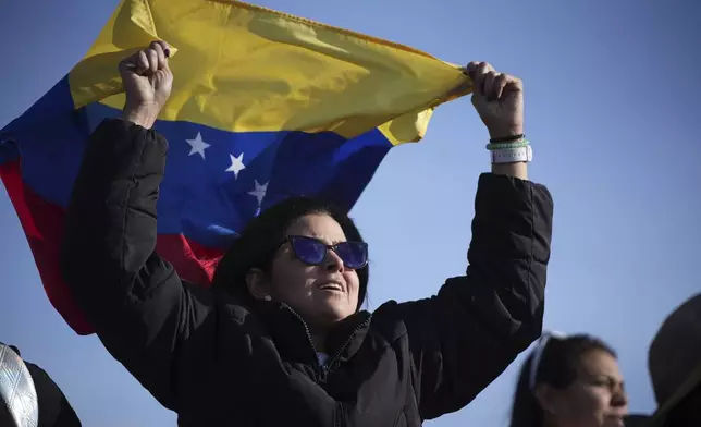 Venezuelan nationals protest against the results of their country's presidential election, in Quito, Ecuador, Saturday, Aug. 3, 2024. (AP Photo/Carlos Noriega)