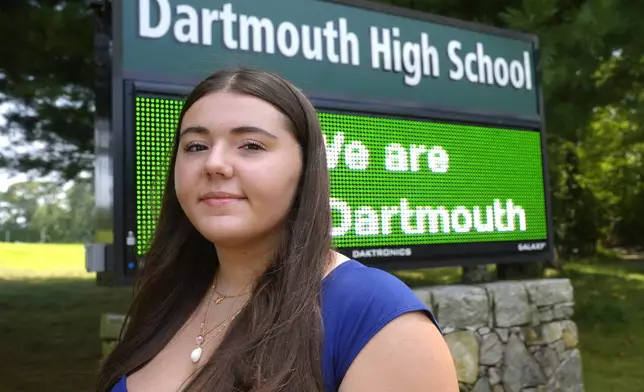 Student Isabella Pires stands for a photograph, Thursday, Aug. 1, 2024, at Dartmouth High School, in Dartmouth, Mass. Pires wrote an opinion piece in her school's newspaper about malaise she sees in school, hoping to start a discussion and maybe get students and adults alike to think about reversing the disengagement that she sees as worsening. (AP Photo/Steven Senne)