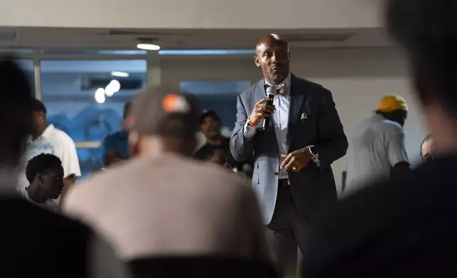 Mawuli Davis, an attorney and human rights organizer, facilitates a panel discussion on the candidacy of Vice President Kamala Harris during a Black Men Lab meeting, Monday, July 22, 2024, in Atlanta. (AP Photo/Stephanie Scarbrough)