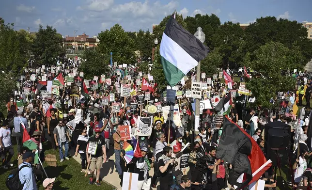 Protesters march to the Democratic National Convention after a rally at Union Park Monday, Aug. 19, 2024, in Chicago. (AP Photo/Noah Berger)