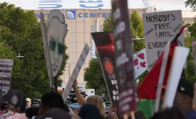 Protesters march during a demonstration outside the Democratic National Convention Wednesday, Aug. 21, 2024, in Chicago. (AP Photo/Alex Brandon)