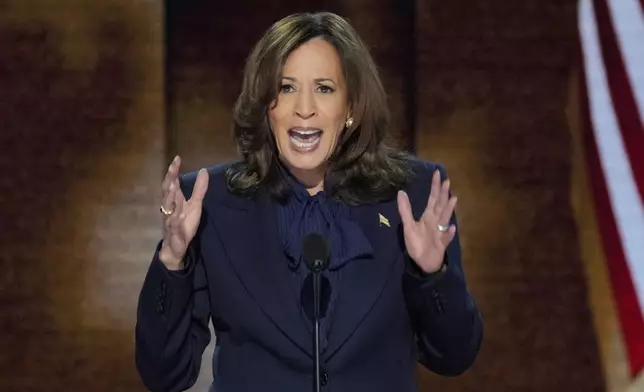 Democratic presidential nominee Vice President Kamala Harris speaks during the Democratic National Convention Thursday, Aug. 22, 2024, in Chicago. (AP Photo/J. Scott Applewhite)