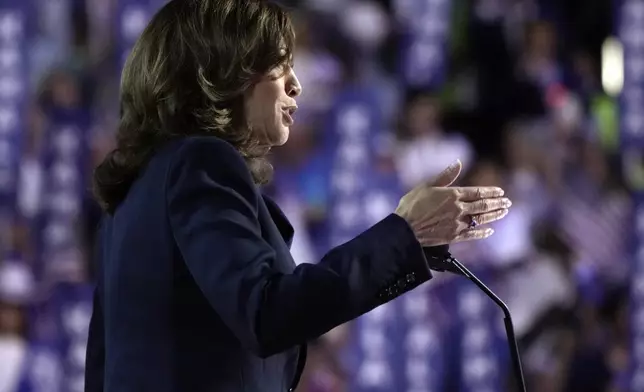 Democratic presidential nominee Vice President Kamala Harris speaks on the final day of the Democratic National Convention, Thursday, Aug. 22, 2024, in Chicago. (AP Photo/Jacquelyn Martin)