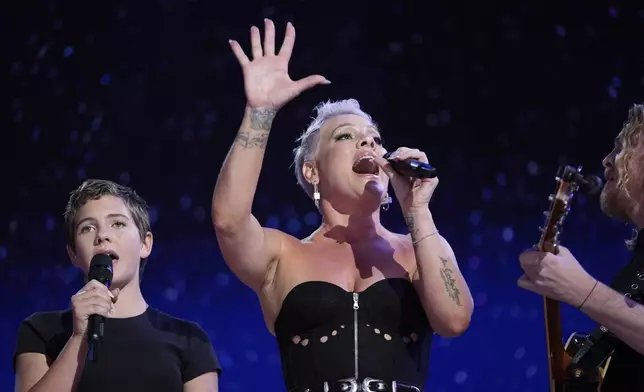 Pink and her daughter Willow Sage Hart perform during the Democratic National Convention Thursday, Aug. 22, 2024, in Chicago. (AP Photo/Paul Sancya)