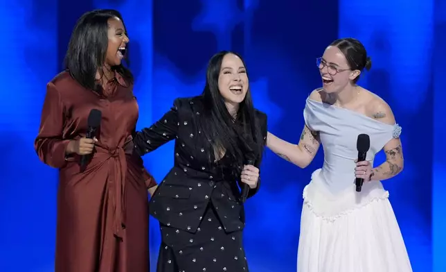 Helena Hudlin, from left, Meena Harris and Ella Emhoff speak during the Democratic National Convention Thursday, Aug. 22, 2024, in Chicago. (AP Photo/J. Scott Applewhite)