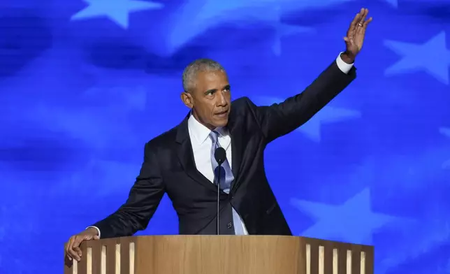 Former President Barack Obama gestures as he finishes speaking at the Democratic National Convention on Tuesday, Aug. 20, 2024, in Chicago. (AP Photo/J. Scott Applewhite)