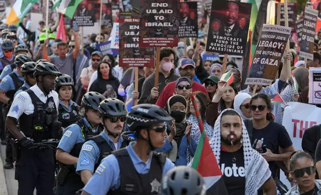 Protesters march during a demonstration outside the Democratic National Convention Wednesday, Aug. 21, 2024, in Chicago. (AP Photo/Frank Franklin II)