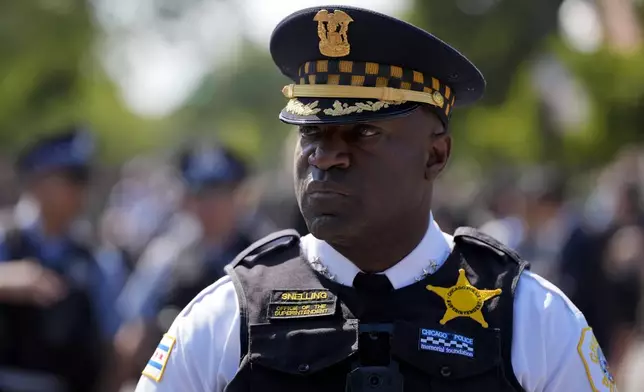 Chicago Police Superintendent Larry Snelling watches a march to the Democratic National Convention Monday, Aug. 19, 2024, in Chicago. (AP Photo/Alex Brandon)