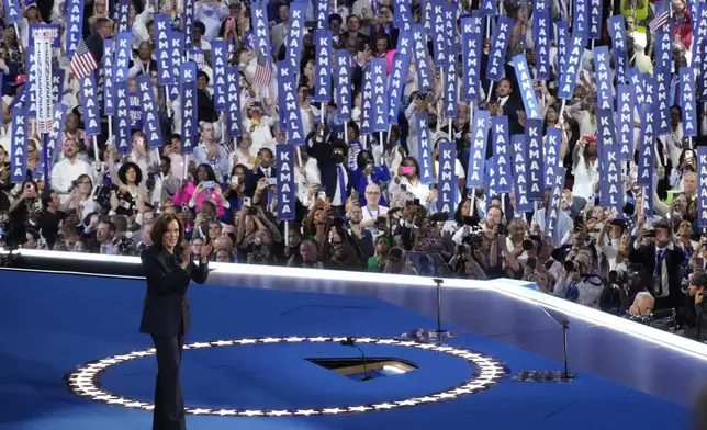 Demoratic presidential nominee Vice President Kamala Harris speaks during the Democratic National Convention Thursday, Aug. 22, 2024, in Chicago. (AP Photo/Morry Gash)