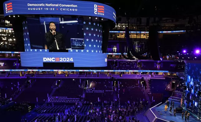 Singer John Legend is seen during a mic check before the Democratic National Convention Wednesday, Aug. 21, 2024, in Chicago. (AP Photo/Morry Gash)