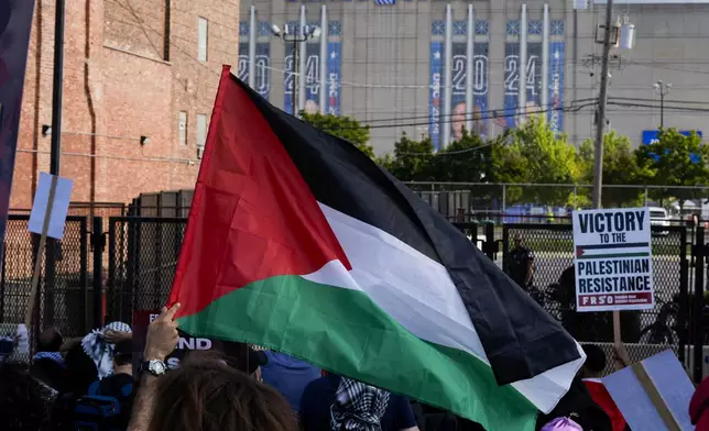 Protesters march to the Democratic National Convention at the United Center after a rally at Union Park Monday, Aug. 19, 2024, in Chicago.(AP Photo/Alex Brandon)