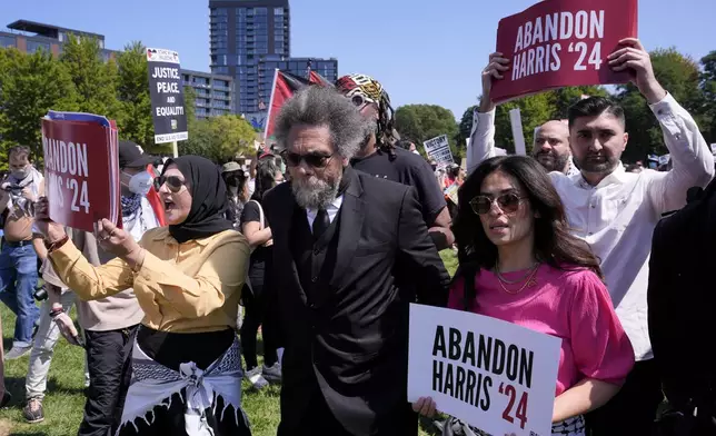 Progressive activist Cornel West watches a demonstration prior to a march to the Democratic National Convention Monday, Aug. 19, 2024, in Chicago. (AP Photo/Alex Brandon)