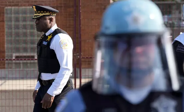 Chicago Police Superintendent Larry Snelling watches a protest at the Democratic National Convention Monday, Aug. 19, 2024, in Chicago. (AP Photo/Alex Brandon)