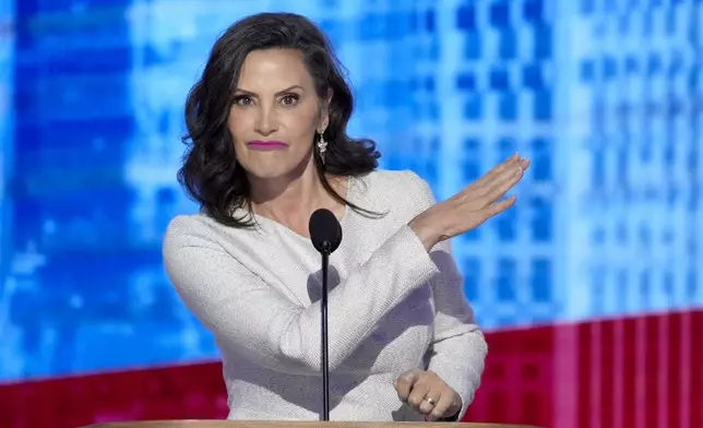 Michigan Gov. Gretchen Whitmer speaks during the Democratic National Convention Thursday, Aug. 22, 2024, in Chicago. (AP Photo/J. Scott Applewhite)