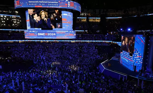 Democratic presidential nominee Vice President Kamala Harris is seen on a video monitor after the roll call during the Democratic National Convention Tuesday, Aug. 20, 2024, in Chicago. (AP Photo/Morry Gash)