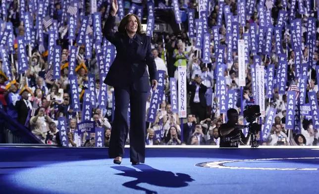 Democratic presidential nominee Vice President Kamala Harris arrives to speak on the final day of the Democratic National Convention, Thursday, Aug. 22, 2024, in Chicago. (AP Photo/Jacquelyn Martin)