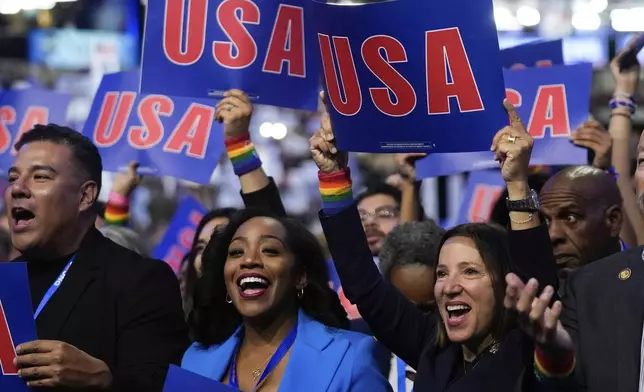 California delegates cheer during the Democratic National Convention Wednesday, Aug. 21, 2024, in Chicago. (AP Photo/Erin Hooley)