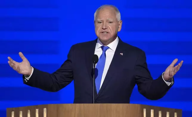 Democratic vice presidential nominee Minnesota Gov. Tim Walz speaks during the Democratic National Convention Wednesday, Aug. 21, 2024, in Chicago. (AP Photo/J. Scott Applewhite)