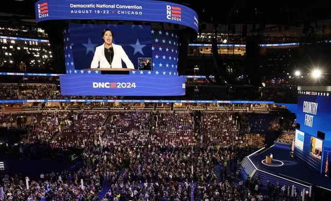 Stephanie Grisham, former Trump White House Press Secretary speaks during the Democratic National Convention Tuesday, Aug. 20, 2024, in Chicago. (AP Photo/Morry Gash)