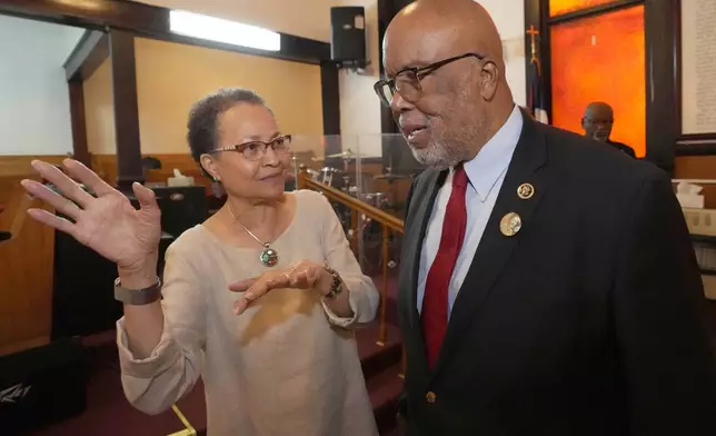 Euvester Simpson speaks with U.S. Rep. Bennie Thompson, D-Miss., June 8, 2024, in Winona, Miss., during the unveiling of a Mississippi Freedom Trail marker commemorating the brutality faced by her and other civil rights activists who were arrested in June 1963, at a bus station in Winona as they returned from an out-of-state citizenship training session. (AP Photo/Rogelio V. Solis)