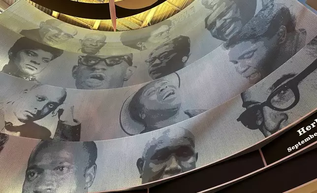 Numerous civil rights activists in the Mississippi Civil Rights Museum's central gallery, including Fannie Lou Hamer, highlight the "This Little Light of Mine" exhibit on Wednesday, Aug. 14, 2024, in Jackson, Miss. (AP Photo/Stephen Smith)