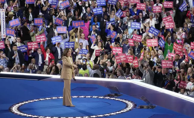 Democratic presidential nominee Vice President Kamala Harris speaks during the Democratic National Convention Monday, Aug. 19, 2024, in Chicago. (AP Photo/Morry Gash)