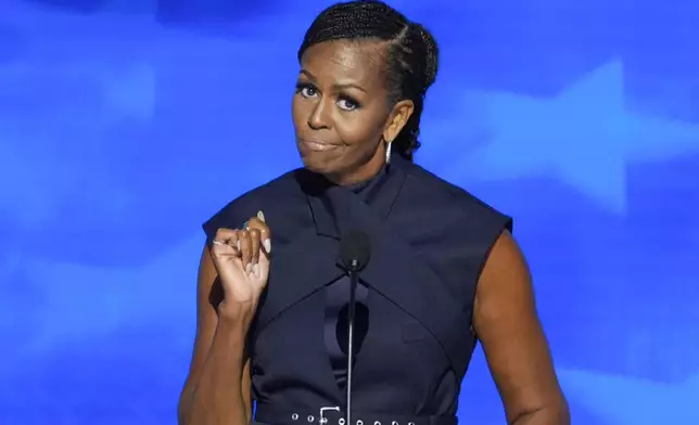 Former first lady Michelle Obama speaking during the Democratic National Convention Tuesday, Aug. 20, 2024, in Chicago. (AP Photo/J. Scott Applewhite)