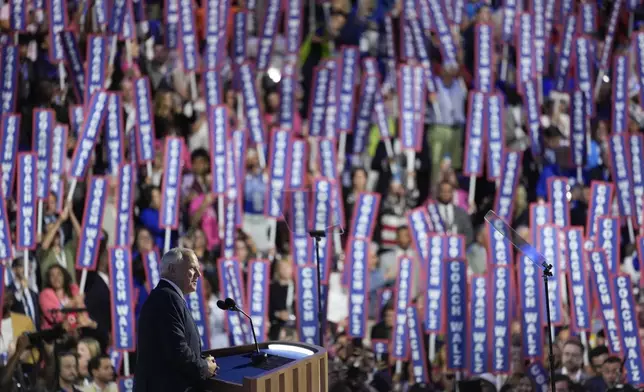 Democratic vice presidential nominee Minnesota Gov. Tim Walz speaks during the Democratic National Convention Wednesday, Aug. 21, 2024, in Chicago. (AP Photo/Matt Rourke)