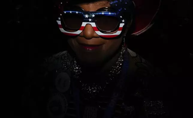 North Carolina delegate Gloria Goodwin wears sunglasses during the Democratic National Convention Wednesday, Aug. 21, 2024, in Chicago. (AP Photo/Brynn Anderson)