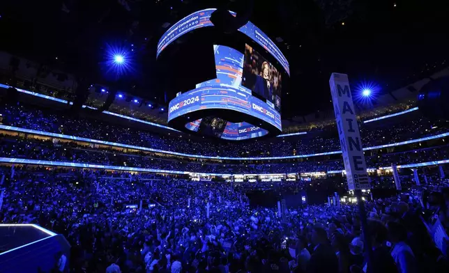 Democratic presidential nominee Vice President Kamala Harris is seen on a video monitor after the roll call during the Democratic National Convention Tuesday, Aug. 20, 2024, in Chicago. (AP Photo/Paul Sancya)