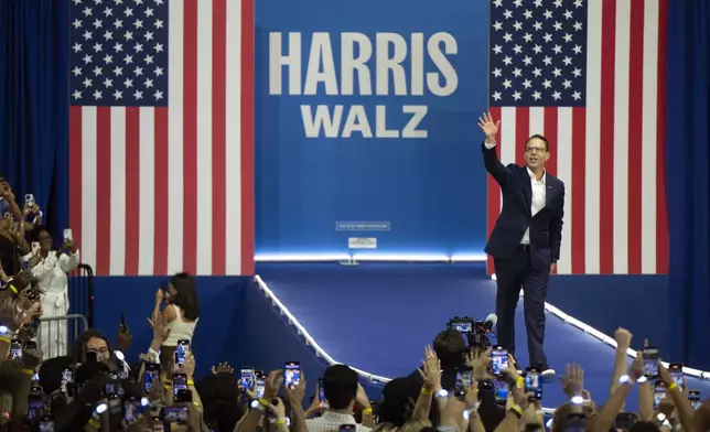 Pennsylvania Gov. Josh Shapiro arrives to speak before Democratic presidential nominee Vice President Kamala Harris and her running mate Minnesota Gov. Tim Walz during a campaign event in Philadelphia, Tuesday, Aug. 6, 2024. (AP Photo/Joe Lamberti)