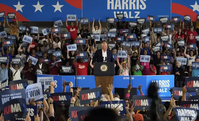 Democratic vice presidential candidate Minnesota Gov. Tim Walz speaks at a campaign rally Wednesday, Aug. 7, 2024, in Romulus, Mich., with Democratic presidential nominee Vice President Kamala Harris. (AP Photo/Carlos Osorio)