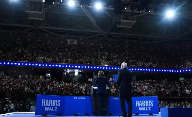 Democratic presidential nominee Vice President Kamala Harris and her running mate Minnesota Gov. Tim Walz speak at a campaign rally in Philadelphia, Tuesday, Aug. 6, 2024. (AP Photo/Matt Rourke)